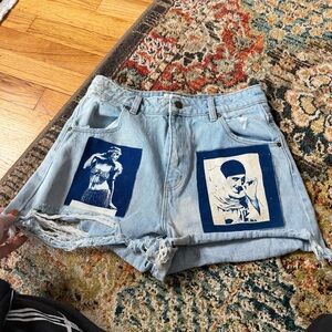 Vintage patches on Rolla’s high waisted denim shirts